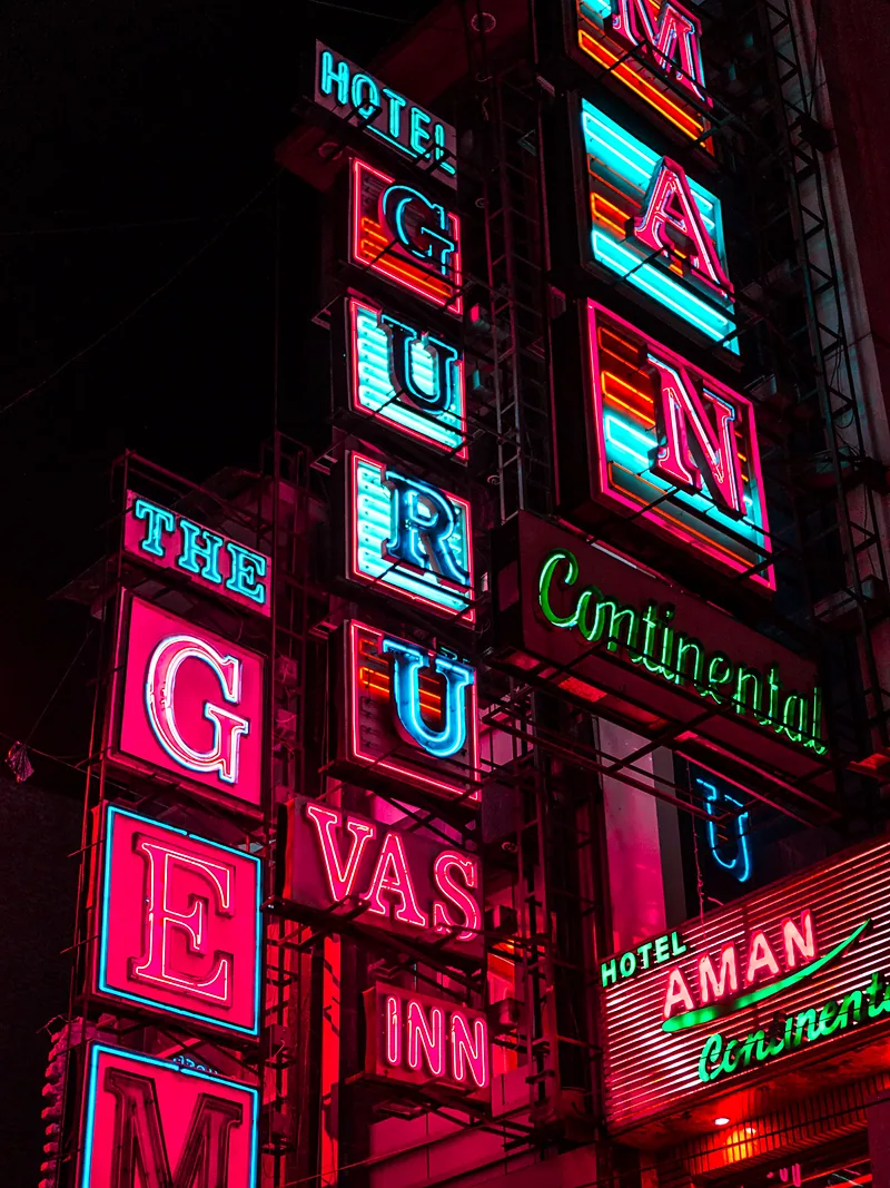 Vertical neon signs glowing at night