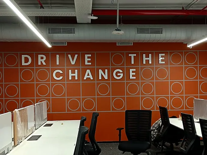 Dimensional letters on a pattern wall (Acrylic Fabrication)