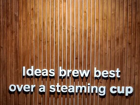 Wood-slat wall with 3D lettering (DI-NOC Film)