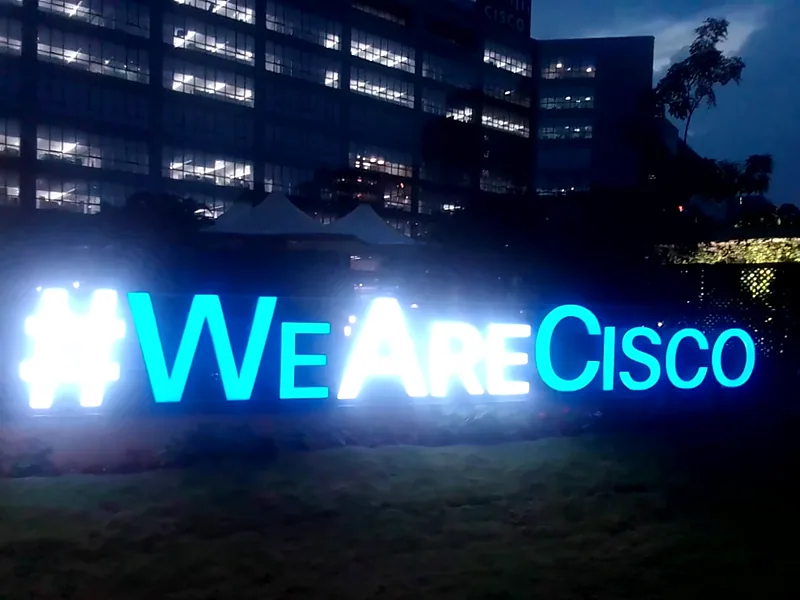 Illuminated hashtag lettering at night (Exterior Logo Signage)
