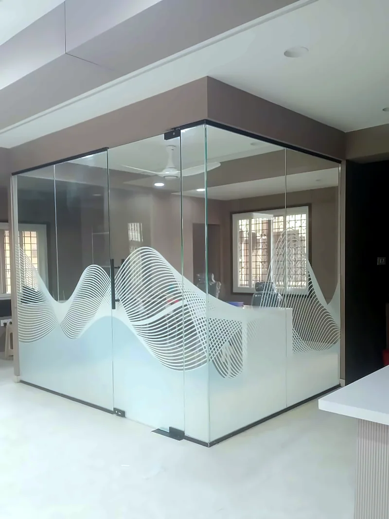 Etched wave pattern on a glass cabin: Glass & Frost