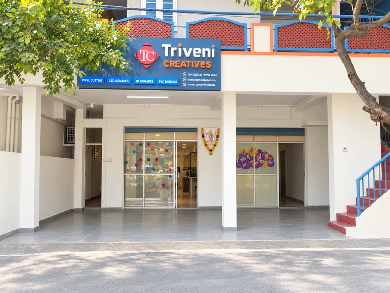 Triveni Creatives shopfront in Padmanabhanagar with the illuminated Triveni signboard