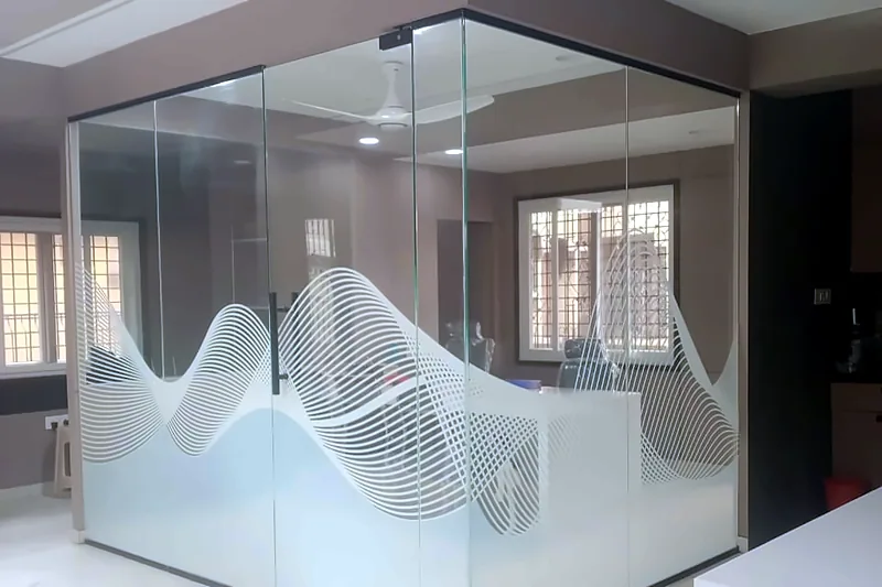 Etched wave pattern on a glass partition